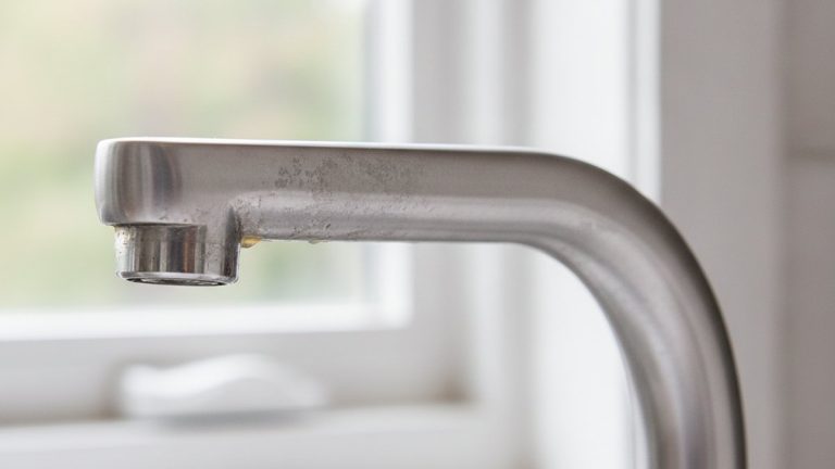 Why Is My Stainless Steel Faucet Discolored, and How Do I Fix It?